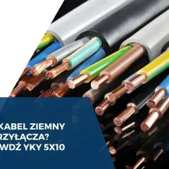 Zbliska widać kilka kabli ziemnych, w tym popularny **YKY** 5x10.